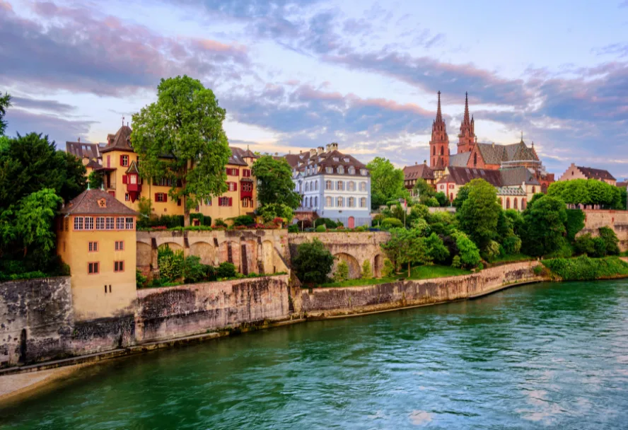 The Rhine bank with the towers of Basel Minster above the houses