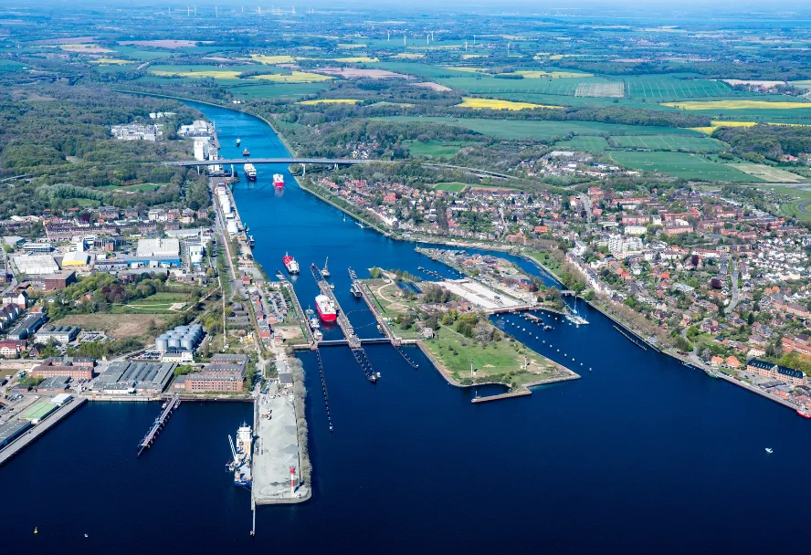 Aerial view over the Kiel fjord with ships in the harbour basin
