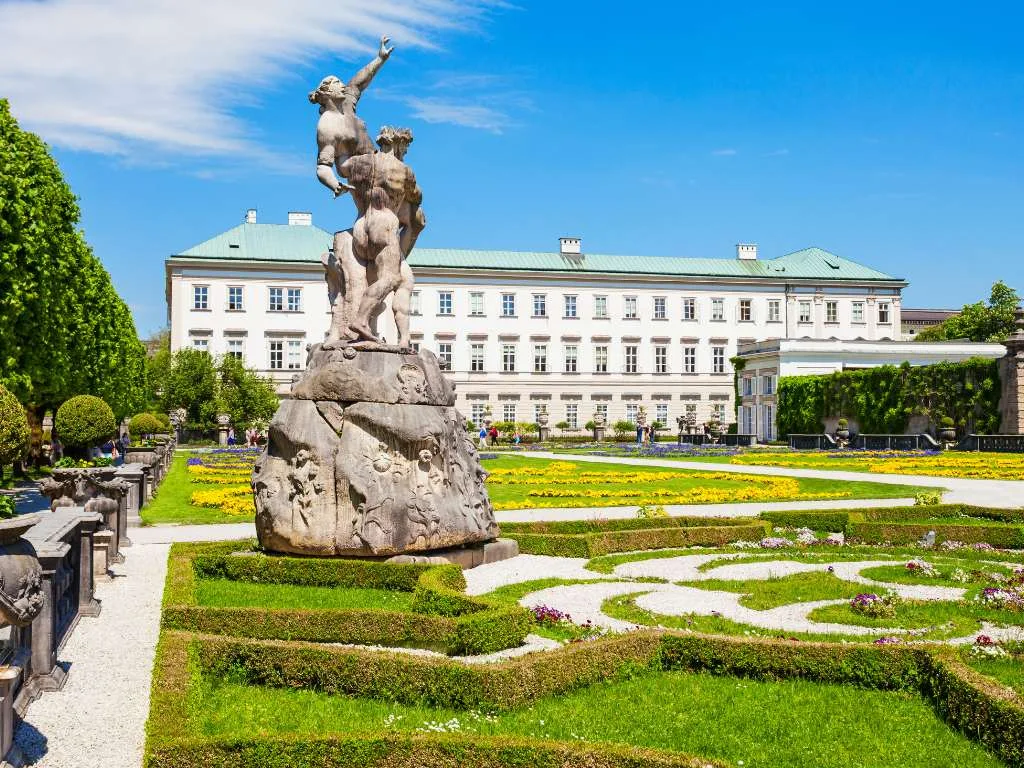 The Mirabell gardens with the Pegasus fountain and the flower beds, Mirabell Palace behind them