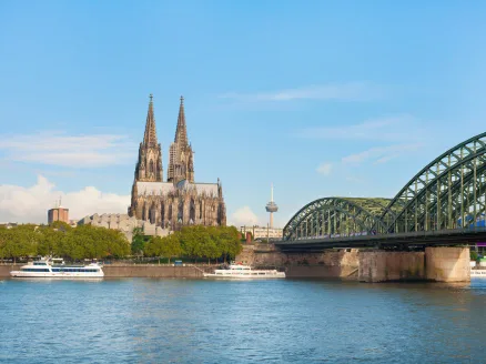Cologne cathedral from the riverside, the Hohenzollernbrücke beside it
